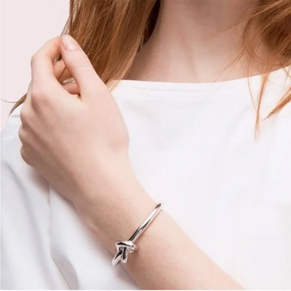 Kate Spade Silver Tone Loves Me Knot Cuff Bracelet NWT and dust bag - Picture 9 of 9
